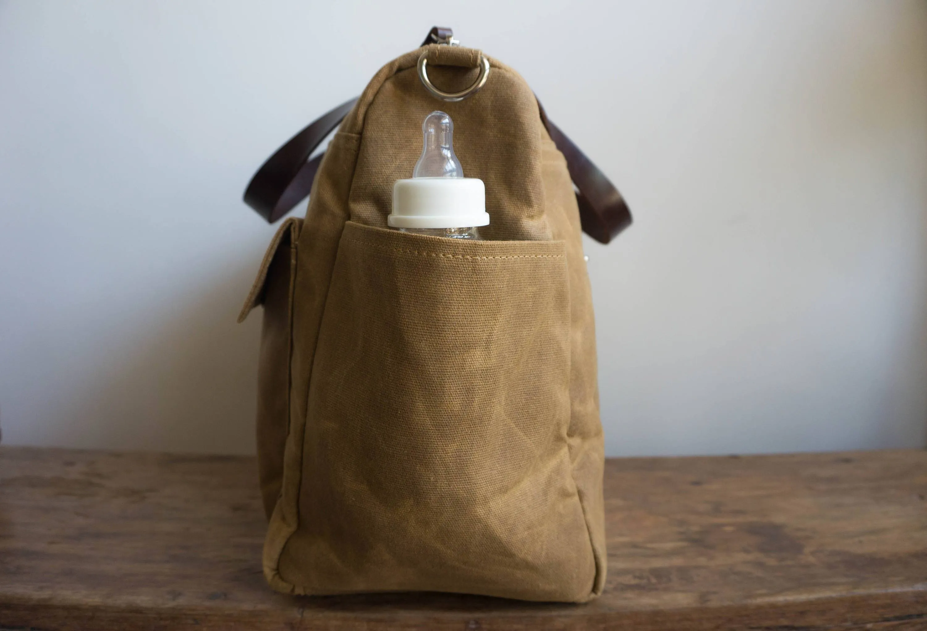 Pipa 11 Pocket Travel Duffel Diaper Bag Tote in Cinnamon Brown | Waxed Canvas & Leather