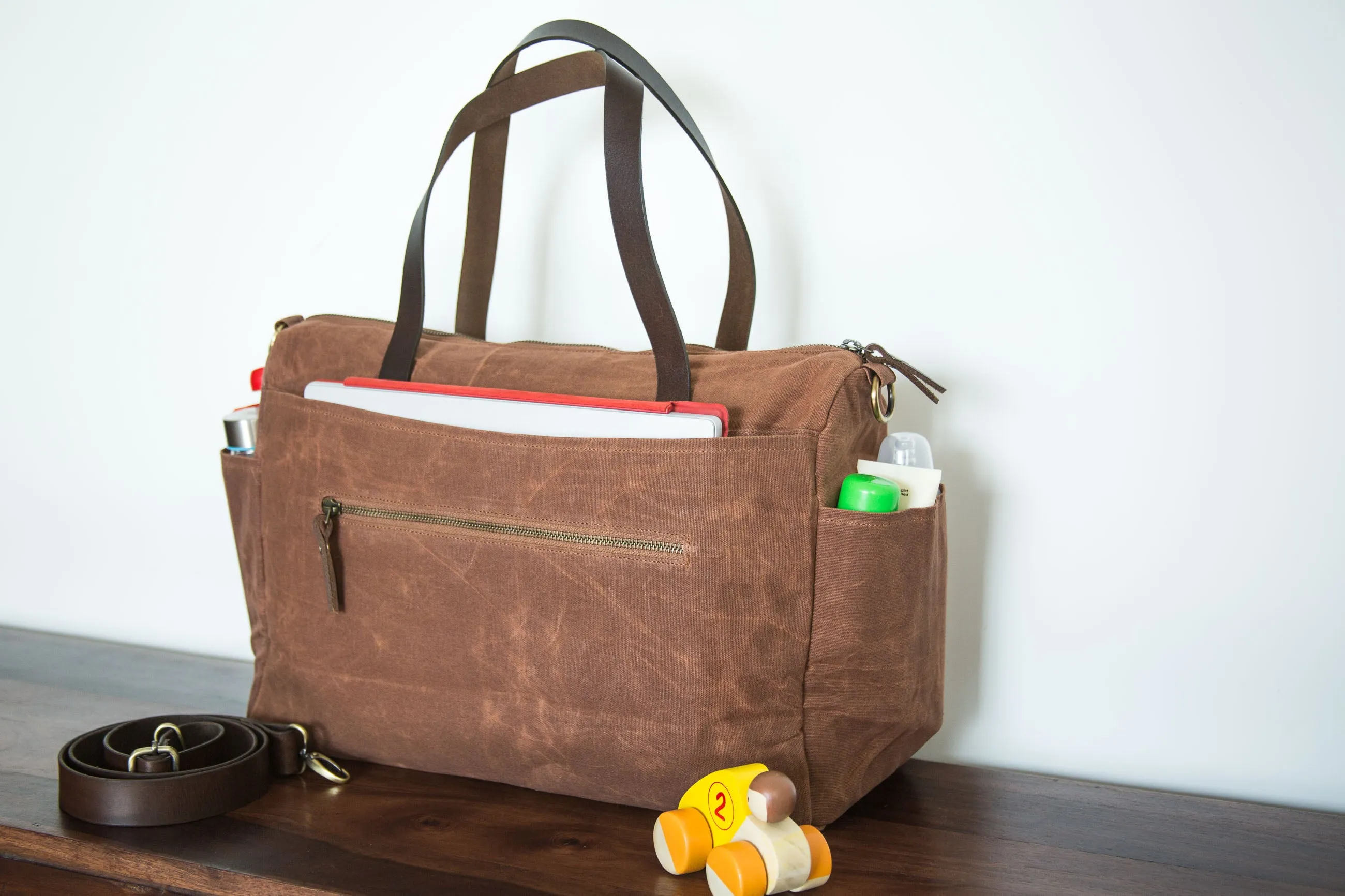 Pipa 11 Pocket Travel Duffel Diaper Bag Tote in Cinnamon Brown | Waxed Canvas & Leather