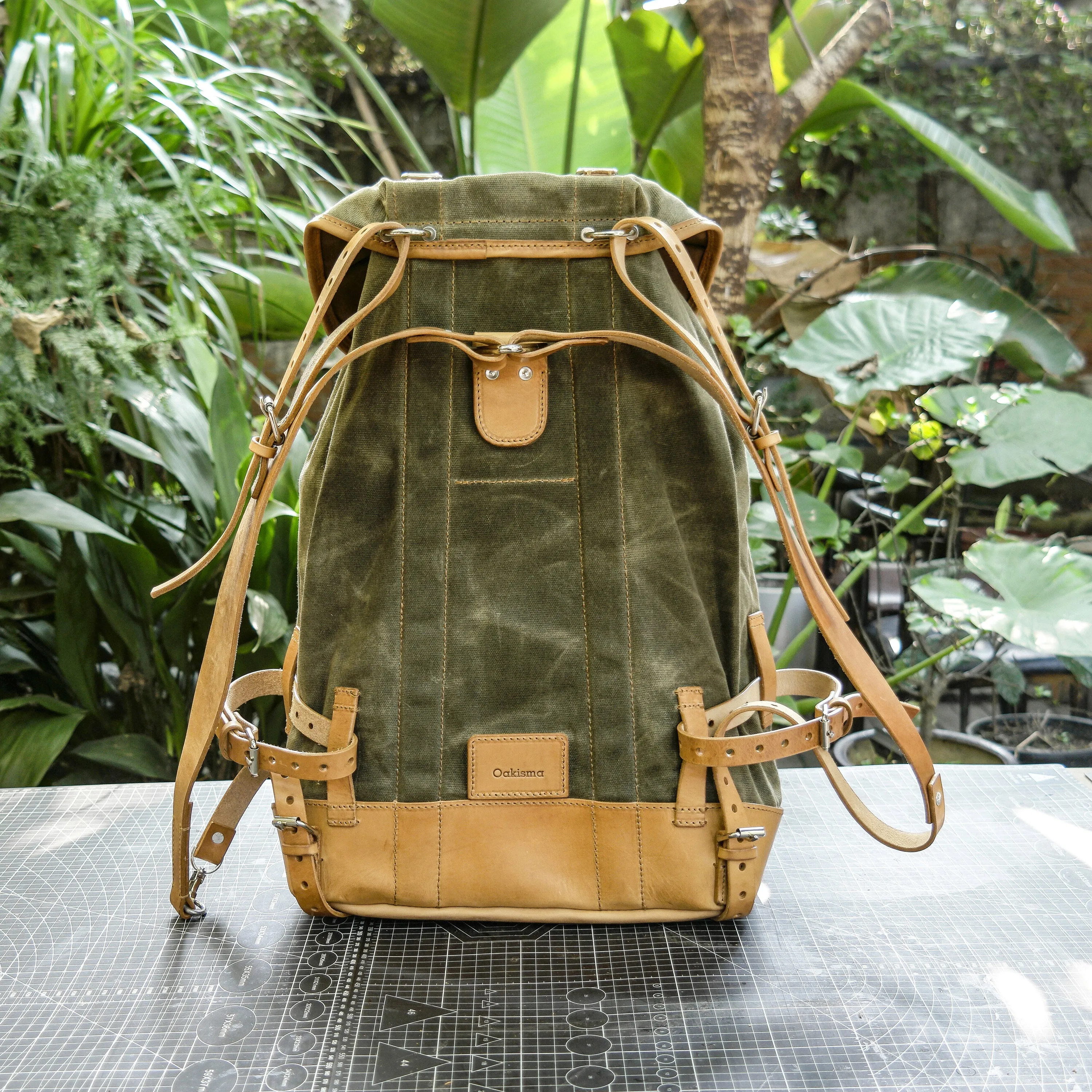 Swiss adventure vintage plant blend cowhide waxed canvas jungle hiking camping handmade backpack