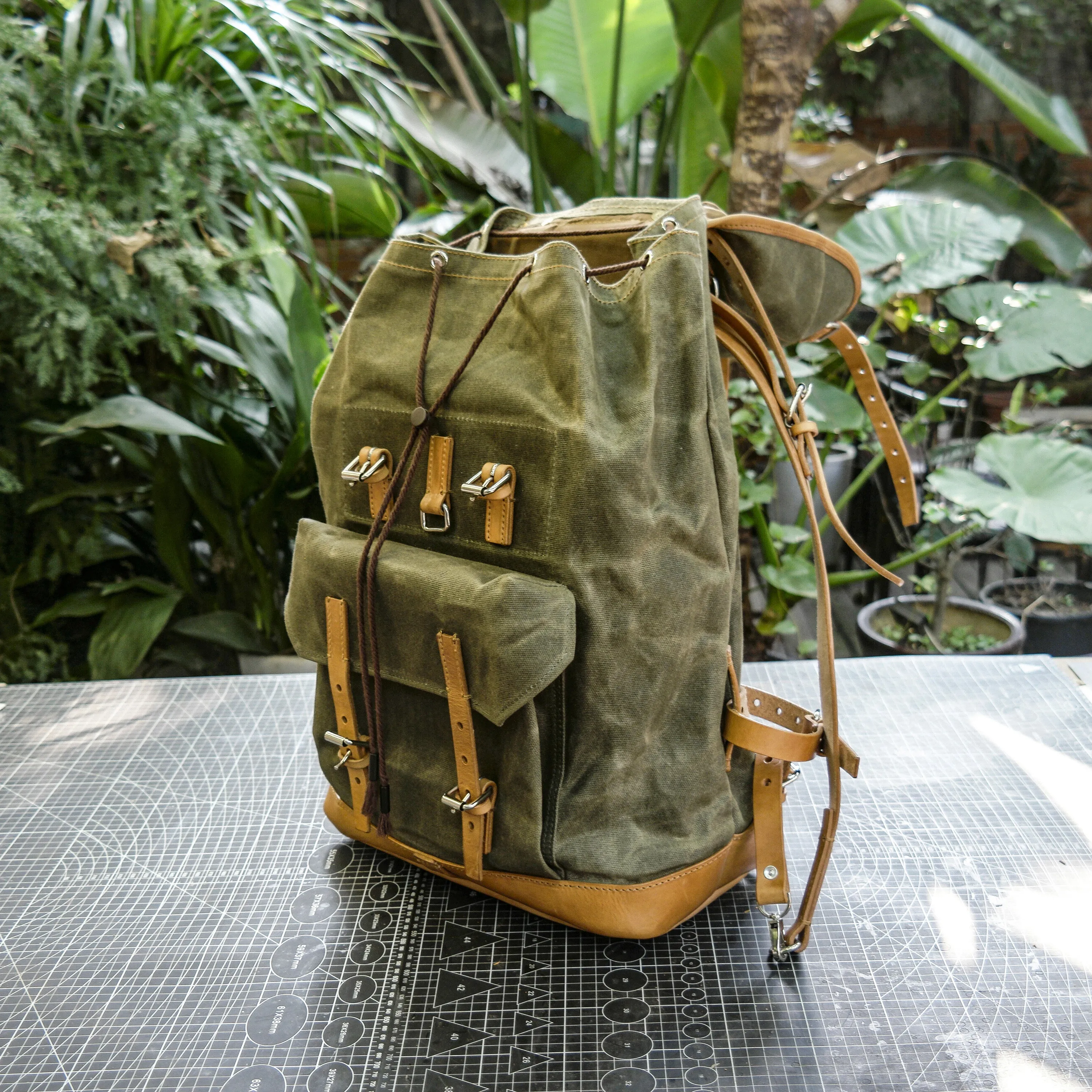 Swiss adventure vintage plant blend cowhide waxed canvas jungle hiking camping handmade backpack