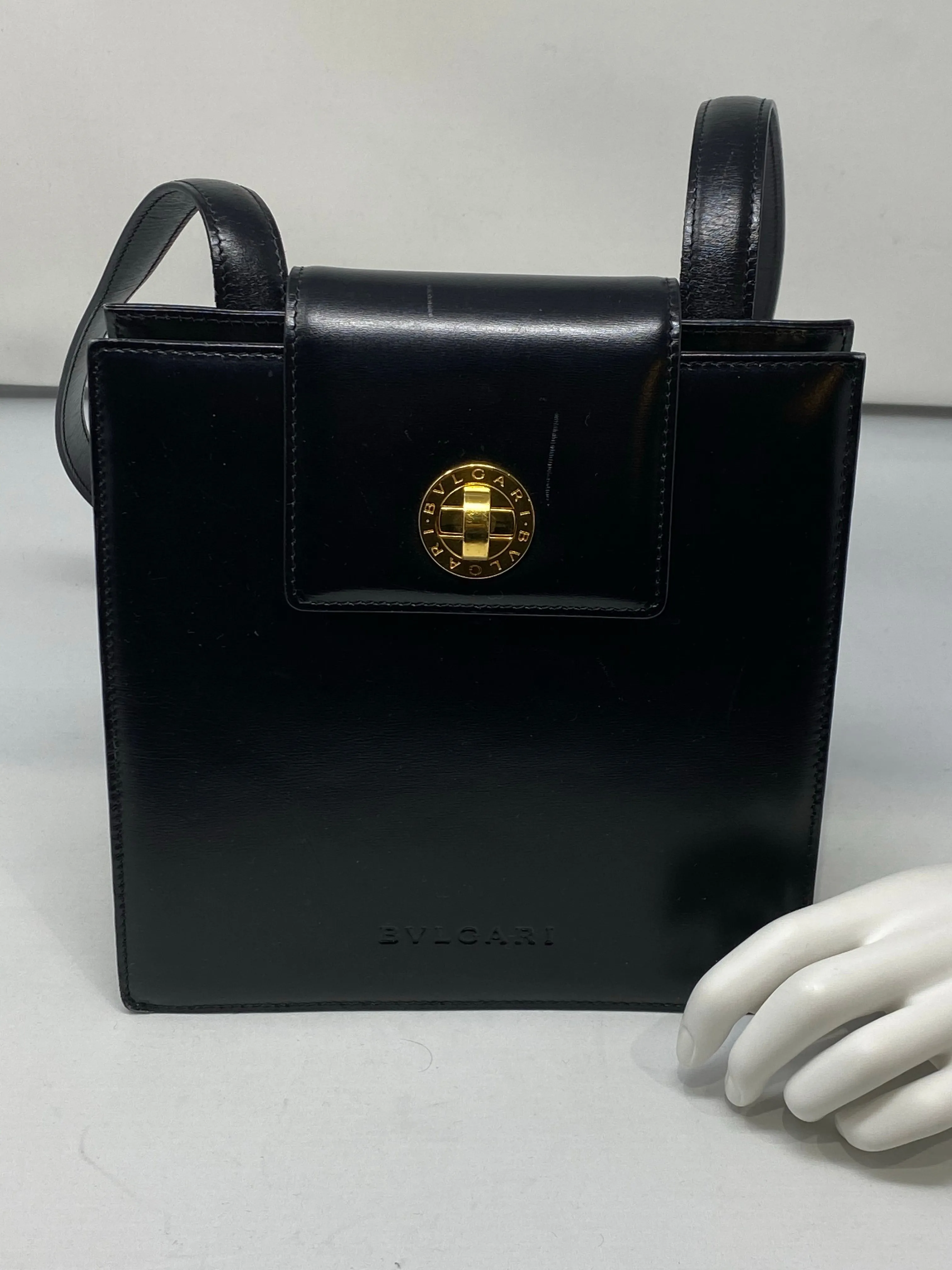 Vintage: BVLGARI black leather single flap Shoulder bag with gold closure and turn lock